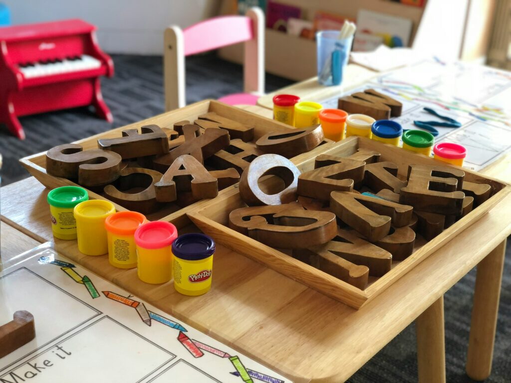 letter blocks and play-doh